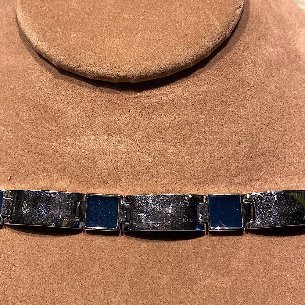 Joan Rivers hinged bracelet.
